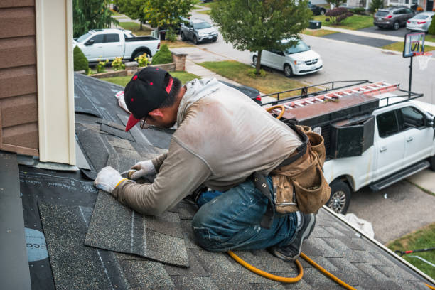 Professional Roofing technician working in Danville, WA